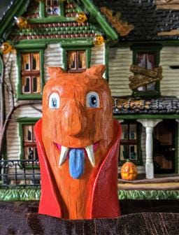 Stewart the Orange Monster, hand carved Halloween figure
